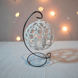 Silver Ornament On Metal Stand